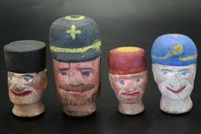 4 alte Marionettenköpfe, Holz