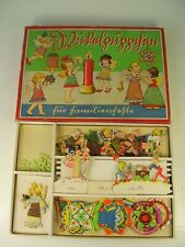 Antikes Spiel Wickelpüppchen